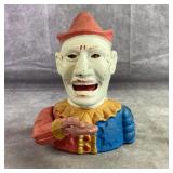 Vintage cast iron clown coin bank