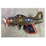 Vintage fighter plane, hand friction toy