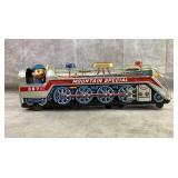 Vintage battery op. tin toy train and conductor Vintage battery op. tin toy train and conductor