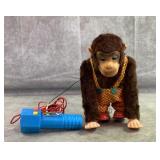 Battery op. Vintage walking chimp with remote