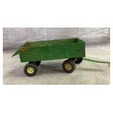 Vintage Ertl metal dumping wagon. Vintage Ertl metal dumping wagon.