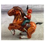 Vintage Tin toy cowboy and horse