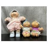 3 cabbage Patch dolls. 14