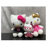 3 hello Kitty plush. 12