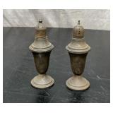 Sterling silver weighted candlesticks. 5
