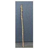 Twisted walking stick with blown glass top