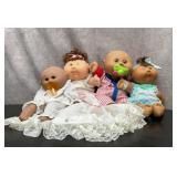 4 cabbage patch dolls 12