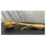 Hand carved face stick 16