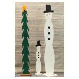 Tall, wooden snowman and Christmas tree