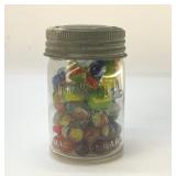 VTG marbles in Corona Jar 5''