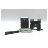 Pocket binoculars and magnifying glass