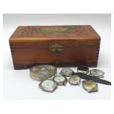 Cedar box with men's wristwatch parts