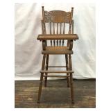 EARLY 1900s OAK HIGH CHAIR CANE SEAT