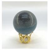 NATURAL TROLLEITE SPHERE ON A CROWN STAND