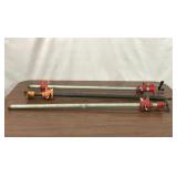THREE 3/4 INCH PIPE CLAMPS