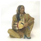 NATIVE AMERICAN CHIEF SITTING RESIN STATUE