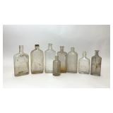 8 VTG CLEAR GLASS MEDICINE ALCOHOL BOTTLES