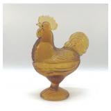 AMBER GLASS ROOSTER ON A NEST 8.5"