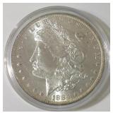 1884 O Morgan silver dollar