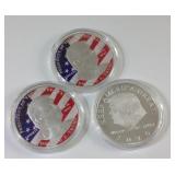 Three Donald Trump coins Three Donald Trump coins
