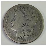 1884 O Morgan silver dollar