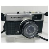 Olympus Trip 35. Black and chrome. 40mm lens. Olympus Trip 35. Black and chrome. 40mm lens.
