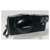 Olympus XA-2. A11 flash. 35mm. Black. Includes Olympus XA-2. A11 flash. 35mm. Black. Includes
