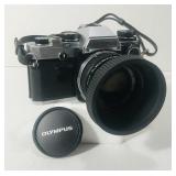 Olympus OM10. 35mm SLR. Black and chrome