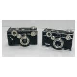 2 Argus C3 35mm. Lens coupled rangefinder. 2 Argus C3 35mm. Lens coupled rangefinder.