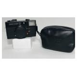 Konica C35. 38mm lens. Black. Case and lens cover Konica C35. 38mm lens. Black. Case and lens cover