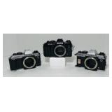 3 Konica FT-1 motor 35mm film cameras. No lenses. 3 Konica FT-1 motor 35mm film cameras. No lenses.