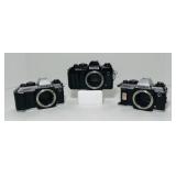 3 Konica FT-1 motor 35mm film cameras. No lenses.