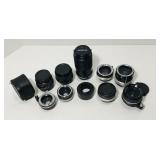 Assortment of converters and lenses. Assortment of converters and lenses.