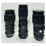 3 Vivitar zoom lenses. 1 300mm, 1 90-230mm and 1