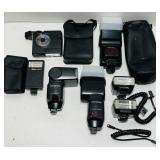 7 Camera Flashes, 3 Nikon, 4 Olympus 7 Camera Flashes, 3 Nikon, 4 Olympus
