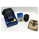 New in box camera case. Fits Nikon. Yashica lens