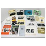 Various camera manuals. Duo sync cord for Nikon.