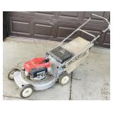 Honda HT214 push mower with bagger. Runs.