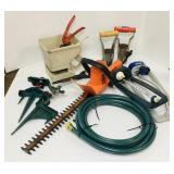 Garden hose, sprinklers, pruning shears, EZ