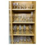 Cabinet Full of Clear Glass Wine and Champagne