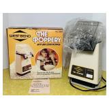 The Poppery Hot Air Popcorn Popper, looks to be The Poppery Hot Air Popcorn Popper, looks to be