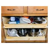 Cabinet full of Pots, Pans, Plastic Bowls Cabinet full of Pots, Pans, Plastic Bowls