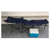 Folding Cot and Coleman Cooler. Folding Cot and Coleman Cooler.