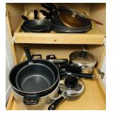 Cabinet full of Frying Pans and Orher Pans