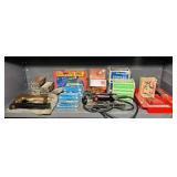 3 Staplers and many boxes of Staples