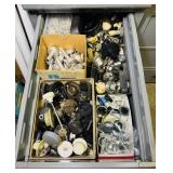 Drawer full of all types of knobs