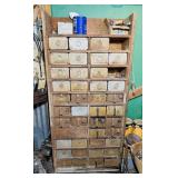 Shelf Full of Metal Anti Freeze Can Drawers