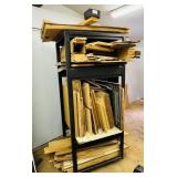 Metal Rack on Wheels loaded with wood