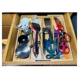 Drawer full of kitchen Utensils