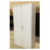 Metal Cabinet, Adj Shelves, Doors latch closed Metal Cabinet, Adj Shelves, Doors latch closed